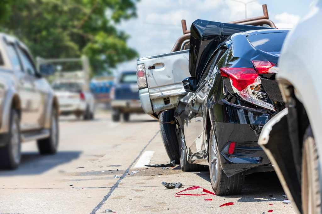 a multiple car pile up on a busy road where multiple parties are involved in an accident