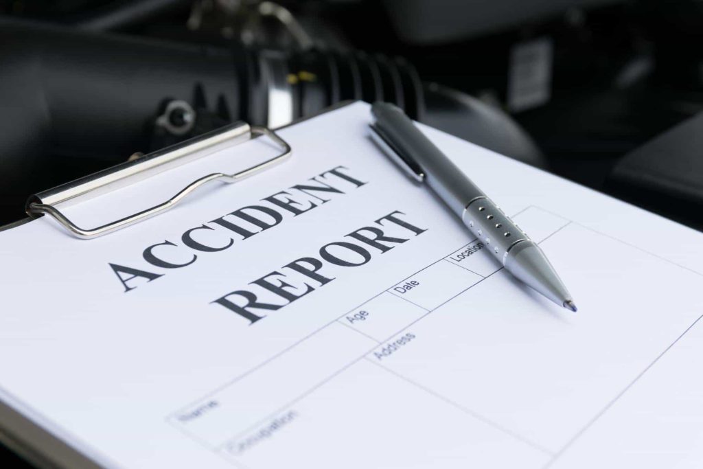 closeup of an accident report form ready to be filled out