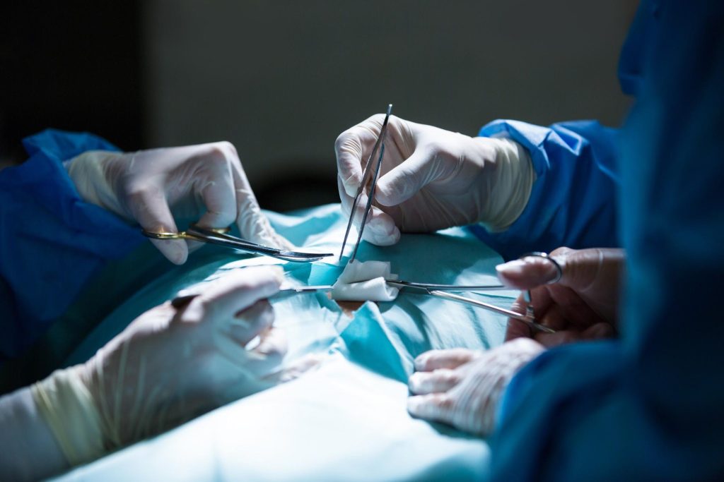 surgeons operating on a car accident victim